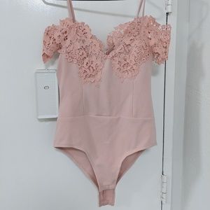 Gorgeous pink lace bodysuit in new condition